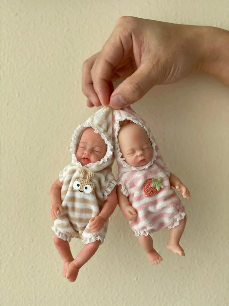 Silicone baby twins (sold separately)